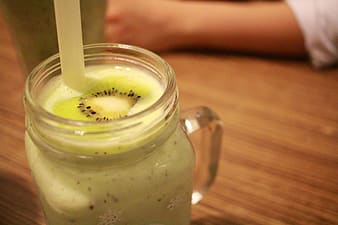 energy smoothie with pineapple kiwi and avocado